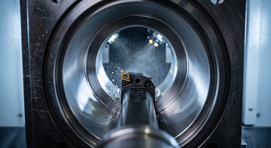A precision boring bar finishing the internal stator seat of a custom motor housing to maintain tight bore concentricity and alignment.